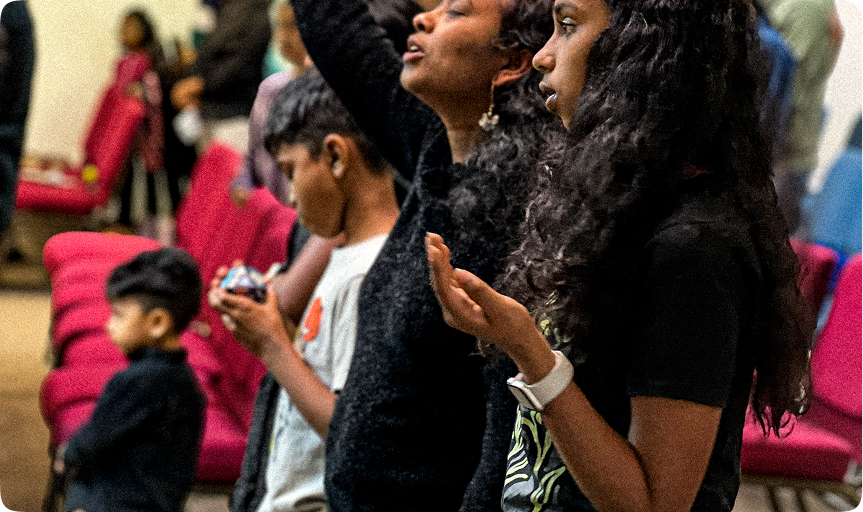 Church members praising God during worship at Spectrum Church San Jose.